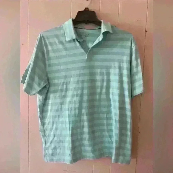 Under Armour Golf Polo Shirt Men XL Short Sleeve Stretch Loose Fit Blue - Picture 1 of 3